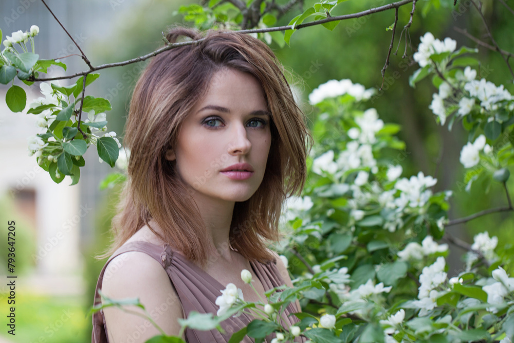 Fashionable healthy woman posing outdoor in spring park, closeup portrait Fashionable healthy woman posing outdoor in spring park, closeup portrait
