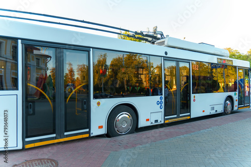 A new modern bus. Modern public electric transport. Details of the bus in close-up, headlights, windshield, driver's cabin.