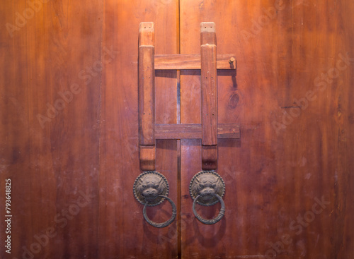 old wooden door with handle, ancient Asian style in the past