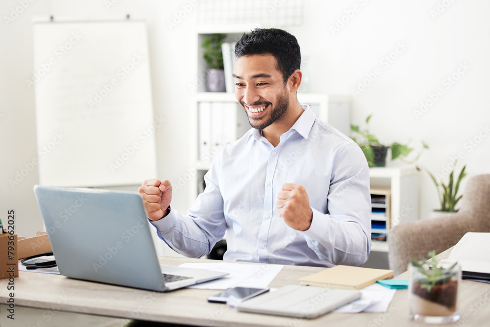 Business man, winner and laptop in office with stock market growth and financial success with fist. Happy, smile and investment profit with accounting promotion and excited professional at a desk Business man, winner and laptop in office with stock market growth and financial success with fist. Happy, smile and investment profit with accounting promotion and excited professional at a desk