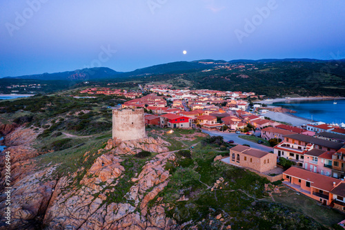 Isola Rossa colorful village aerial drone at sunset in Sardinia photo
