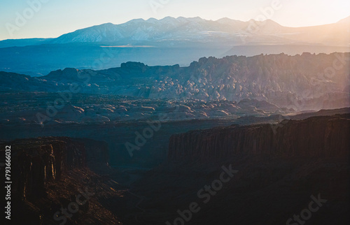 Fins and arches from Long Canyon at sunrise near Moab, Utah photo