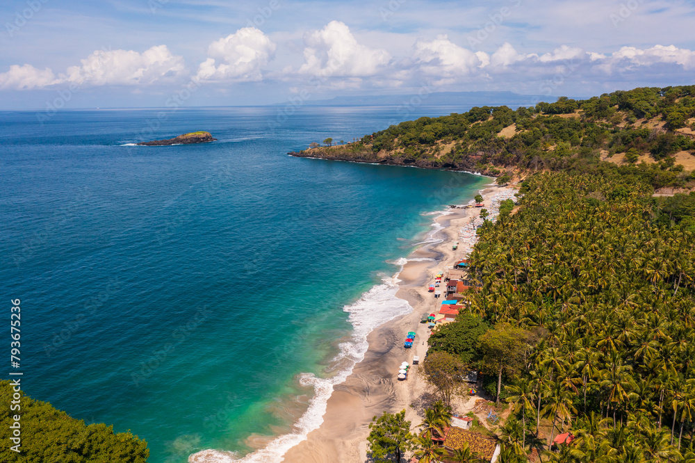 Bali, Indonesia: Aerial view of the dramatic Virgin beach near Amlapura and Candidasa in eastern Bali Karangasem region