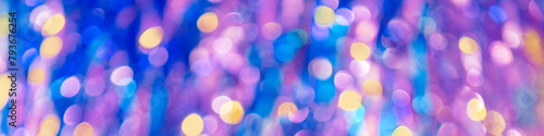 Blue-pink abstract background of blurred shiny lights. Horizontal banner © vvvita