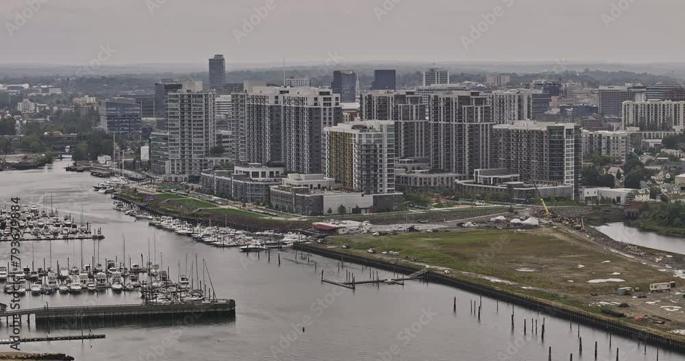 Stamford Connecticut Aerial v5 zoomed flyover Waterside area capturing apartment buildings situated along Long Island Sound with boats docked at the marina - Shot with Mavic 3 Pro Cine - October 2023 Stamford Connecticut Aerial v5 zoomed flyover Waterside area capturing apartment buildings situated along Long Island Sound with boats docked at the marina - Shot with Mavic 3 Pro Cine - October 2023