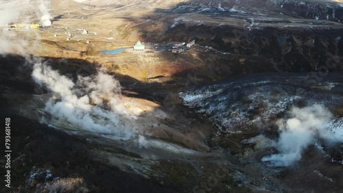 drone footage over the valley of geysers in the mountains