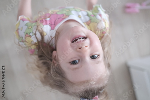 little girl looks up © skypictom
