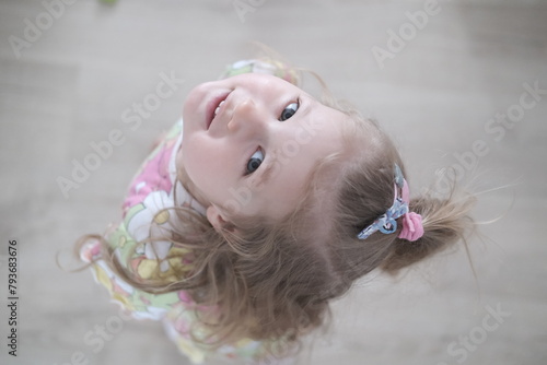 little girl looks up © skypictom