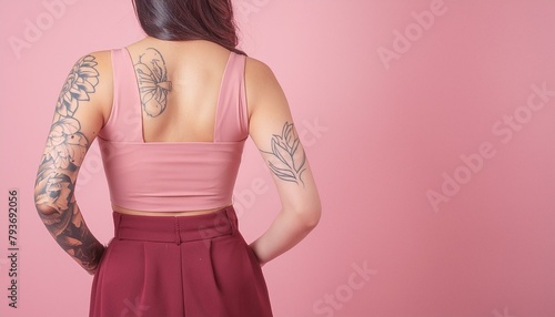 Woman with tattoos on her back