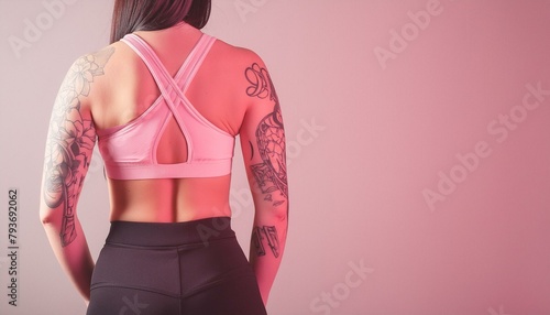 Woman with tattoos on her back