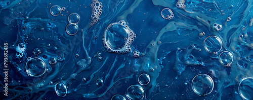 Set foam soap bubble isolated on dark blue background top view.