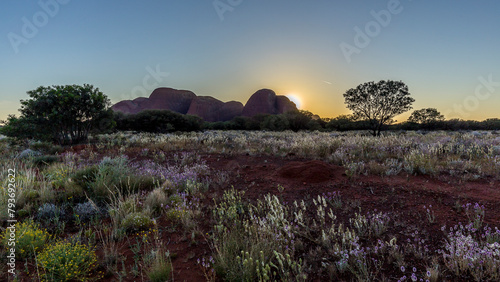 sunrise behind the Olga Mountains, Red Center, Australia photo
