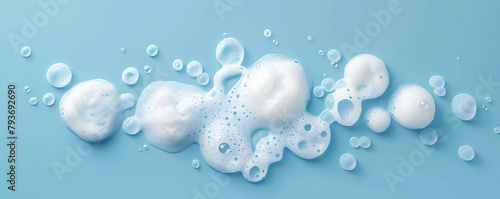 Set foam soap bubble isolated on blue background top view.
