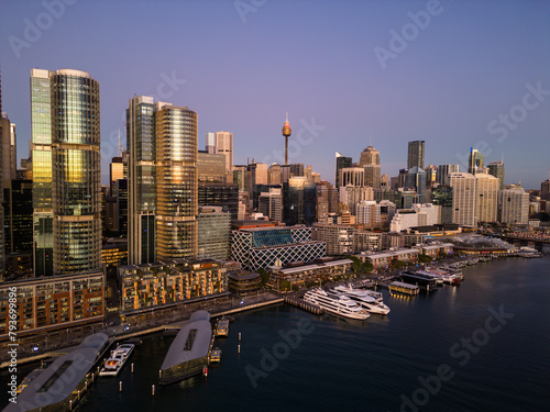Obraz na płótnie Sydney, Australia: Aerial view ferry waits at the Barangaroo Wharf in the Darling Harbor newly redeveloped district in downtown Sydney at sunset. w salonie