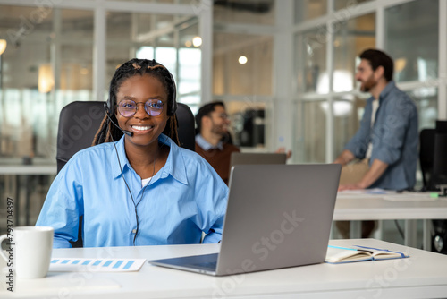 Joyful woman call center agent consulting customer service support