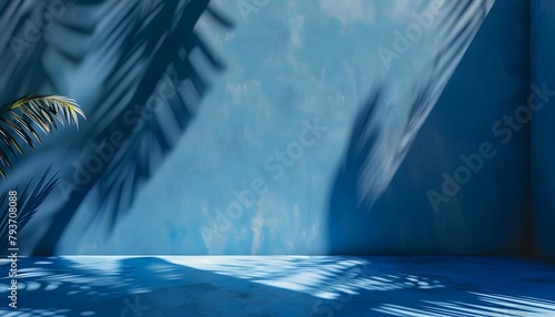 Minimal abstract blue background for product presentation, shadows on the wall and floor