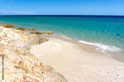 Pinus Village  beach, with sand and rock in  Pula, Santa Margherita, Sardinia, Italy.