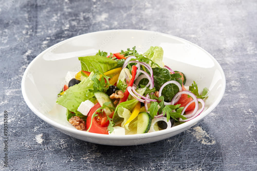 greek salad on the grey background greek salad on the grey background