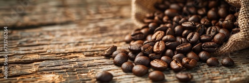 Closeup of coffee beans spilling from a burlap sack, highlighting the texture and rich color, with a rustic wooden background photo