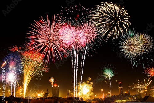 The rhythmic booms of fireworks echoed through the night, signaling the joyous occasion.