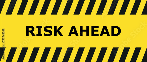 yellow road sign as a warning of risk ahead