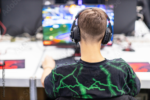 Gamer playing online computer video game. E-sports or gaming concept.