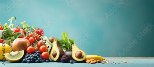 Assorted fresh produce on a wooden table © Ilgun