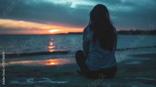 Fototapeta Naklejka Na Ścianę i Meble -  Young woman sitting beach sunset sea sand mental health thinking looking