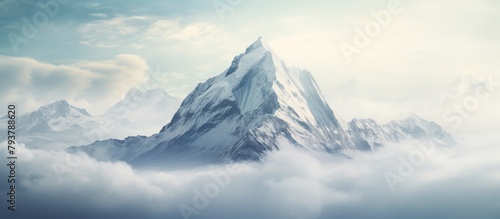Snow-capped peak among towering mountains