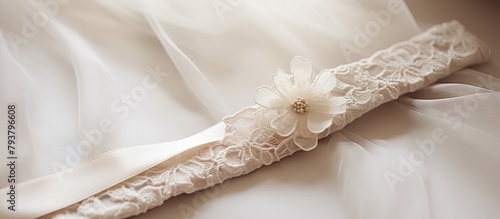 Bridal gown flower detail photo
