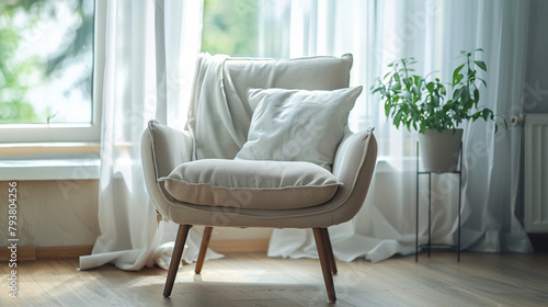 Minimal decorating soft comfort pillow armchair with daylight from window 