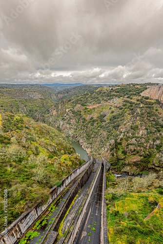 View across the valley from the Almendra Dam also known as Villarino Dam in Salamanca, Spain photo