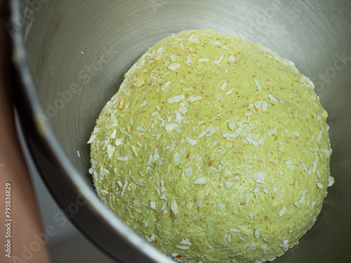 green pandan and coconut bread dough in bulk fermentation