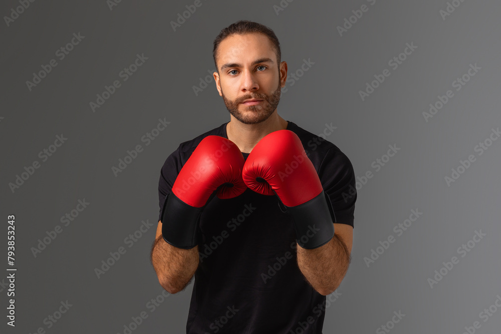 Man in Black Shirt and Red Boxing Gloves