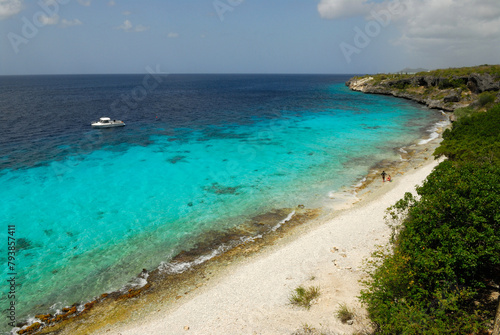 A dive boat near a sandy beach in the Caribbean © Richard Nantais