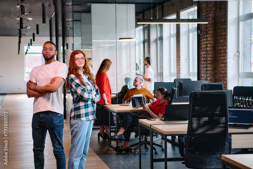 Photography An African-American business colleague and his orange-haired female counterpart