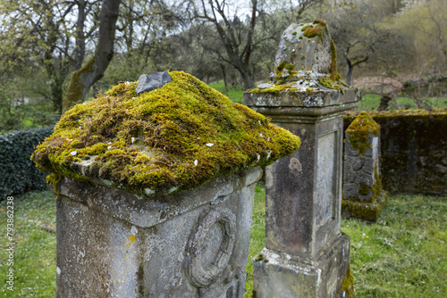 Tombstones at historical and abandoned Jewish cemetry at Lösnich Graveyard with gate with Davidstar. Rhineland-Palatinate. River Moselle area.
