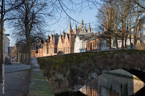 Meebrug: an old stone bridge over the Groenerei canal at the bottom of Meestraat, Bruges, Belgium