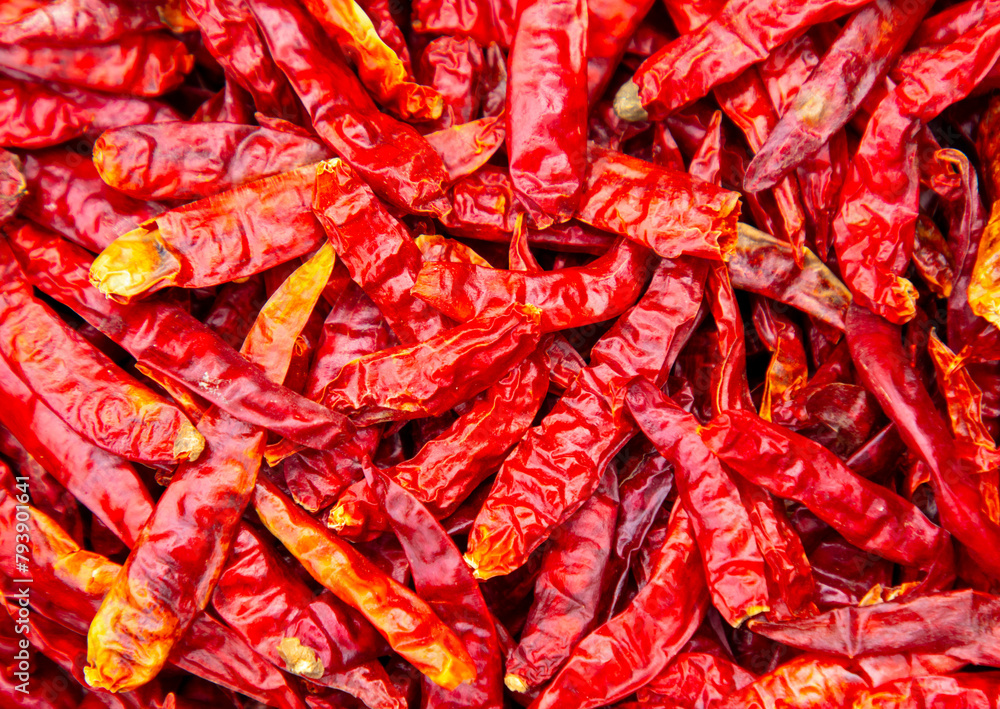 Dried red chili peppers as an abstract background. Texture Dried red chili peppers as an abstract background. Texture