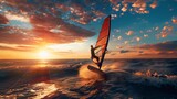 A windsurfer is silhouetted against the sunset, with a natural blue sky version also available