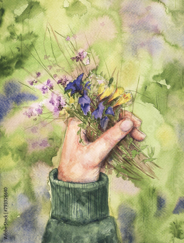 Watercolor drawing. A hand with wildflowers (ID: 793926640)