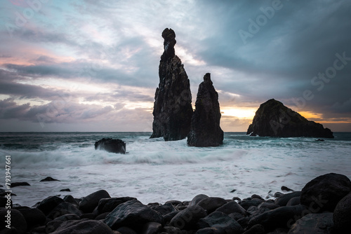 Ribeira da Janela. Volcanic  rock formations standing the Atlantic Ocean at dramatic sunrise, Madeira Island, Portugal