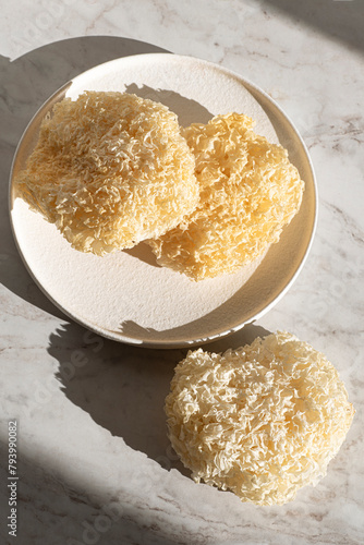 Wallpaper Mural Tremella mushrooms or  white coral fungus or snow ear, are edible mushrooms  have a   anti-inflammatory and antioxidant properties: for salads, soups, biological additive in Asia, Korea, China, Russia Torontodigital.ca