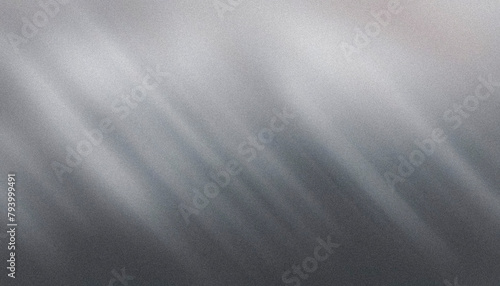 Abstract textured gray background with light rays