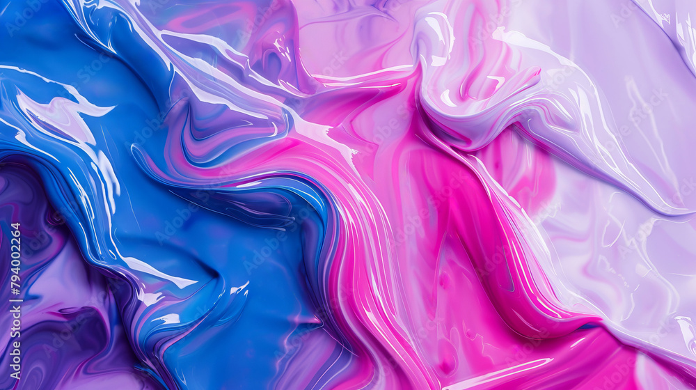 Fototapeta premium Closeup view of a swirling pattern of purple and pink paint