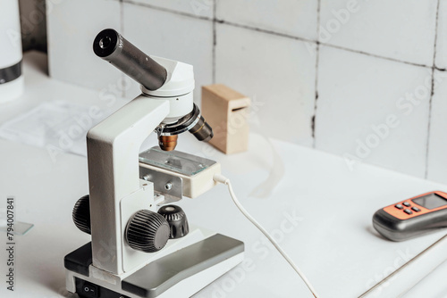 microscope symbolizing the precision and careful analysis required in scientific fields like biology and chemistry