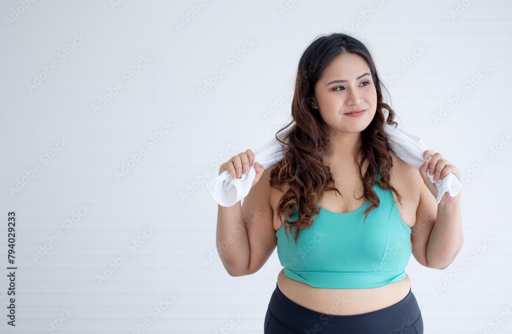 portrait of chubby woman in exercise clothes with copy space portrait of chubby woman in exercise clothes with copy space