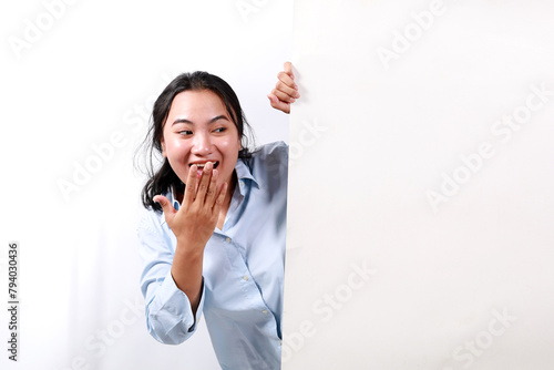 Portrait of young nice attractive lovely pretty glad excited cheerful cheery positive woman demonstrating copy space board ad isolated over white background
