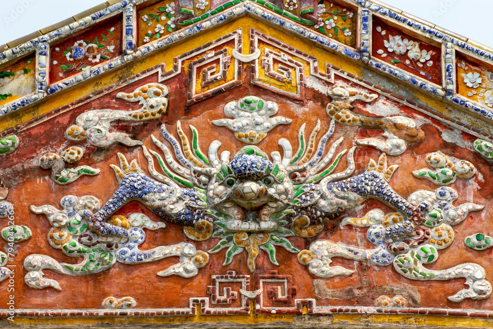 Detail Of Ceramic Mosaic Dragon Of A Palace In Hue Imperial Citadel. Hue Imperial Citadel, A UNESCO Cultural Heritage Is A Major Tourist Destination In Vietnam.