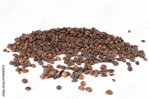coffee beans are scattered on the table